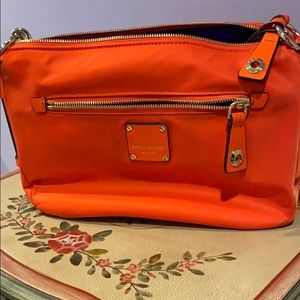 Orange with purple satin lining nylon bag